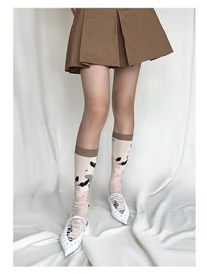 LIMISEVEN · Muted-Tone Hand-Drawn Floral Calf Socks