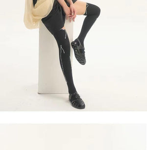 LIMISEVEN · Hand-Stitched Irregular-Line Knee-High Socks
