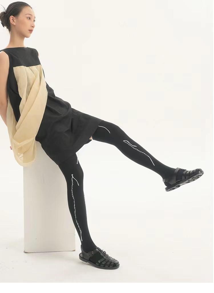 LIMISEVEN · Hand-Stitched Irregular-Line Knee-High Socks