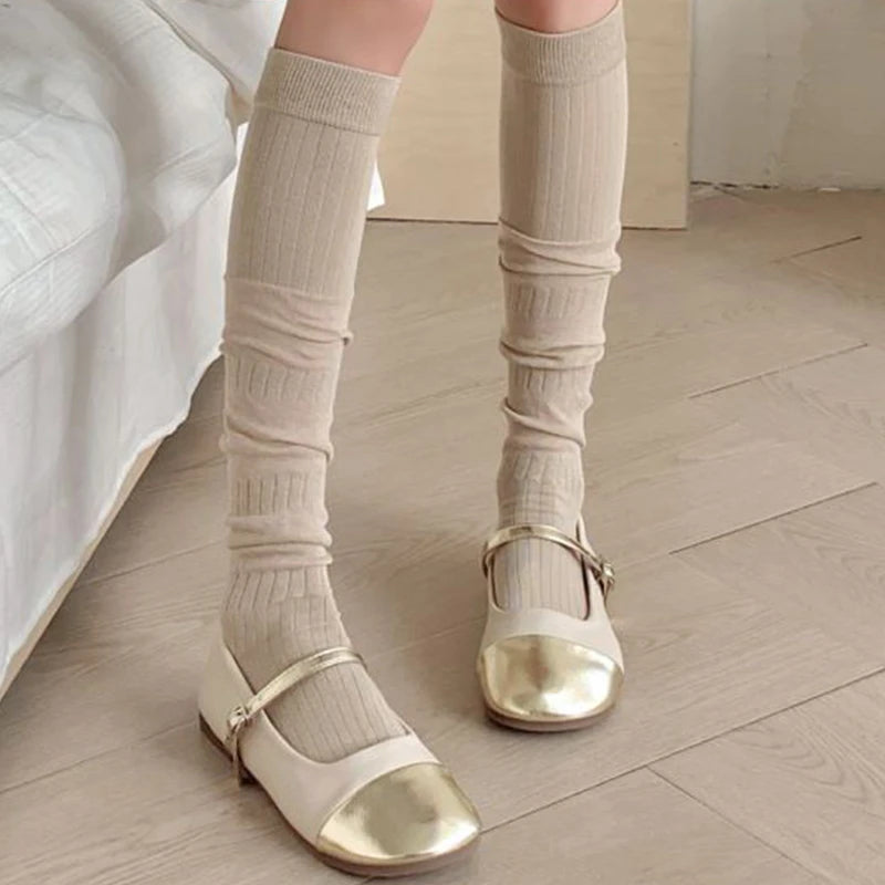 LIMISEVEN · Solid-Color Ribbed Mid-Calf Slouch Socks