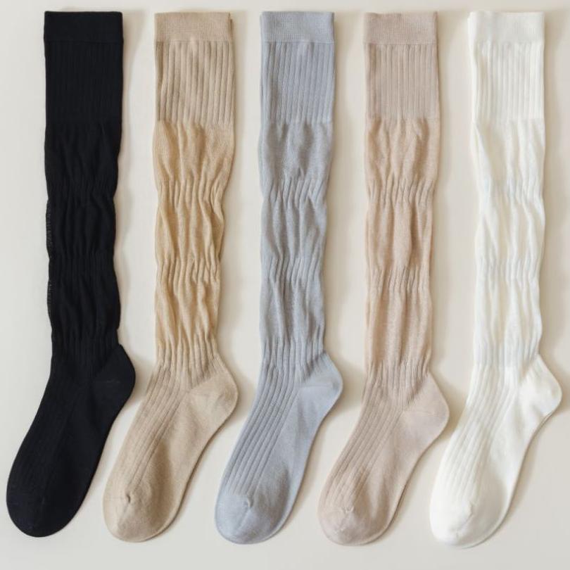 LIMISEVEN · Solid-Color Ribbed Mid-Calf Slouch Socks