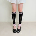 limiseven striped ribbed logo studded design stacked sock sleeves